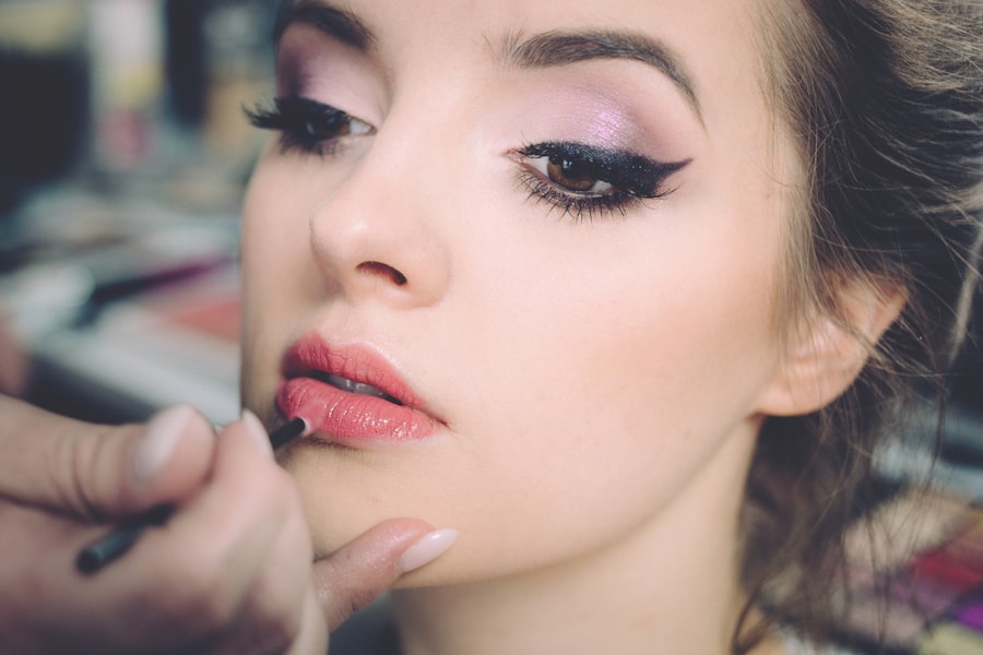Applying AVM lipstick
